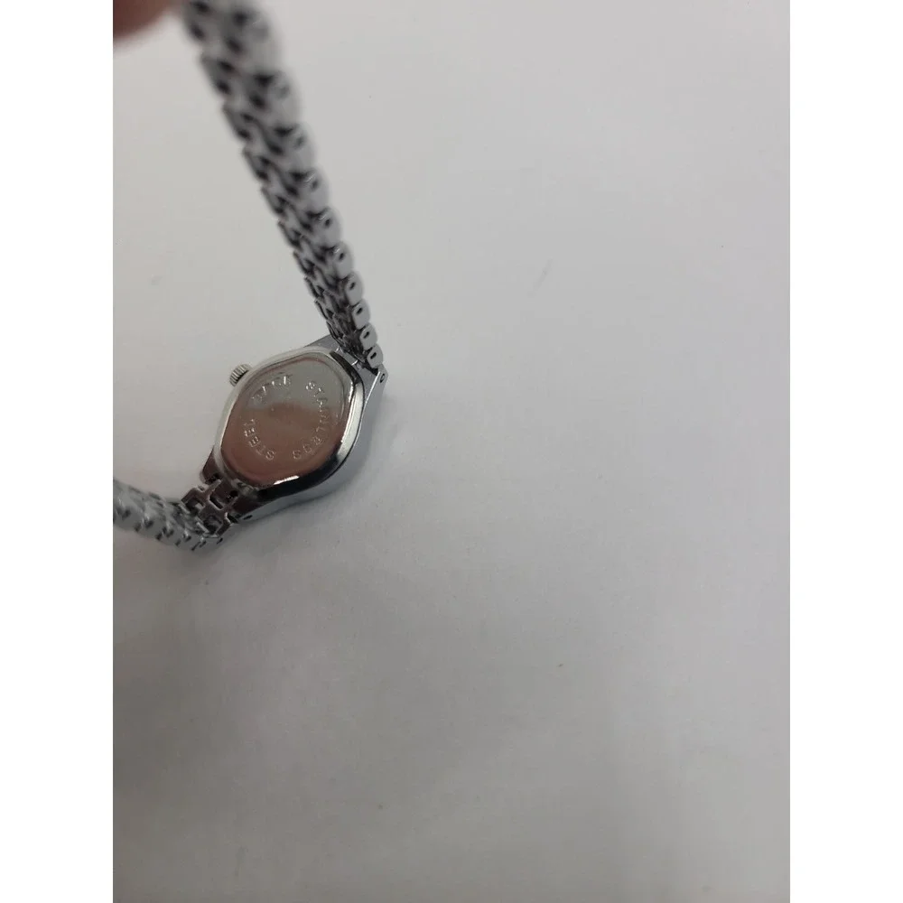 Chaoyada Women's Quartz Watch‎ Silver Tone Bracelet White Dial Analog Wristwatch
